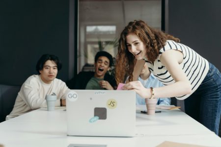 pexels-cottonbro-7437495 Developers managing source code with GitHub and Jenkins.
